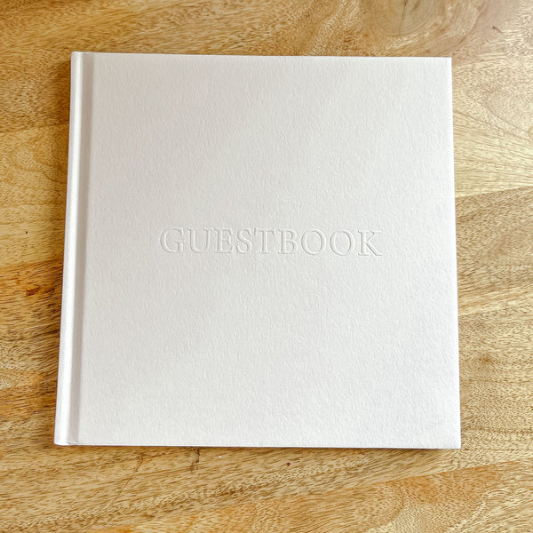 White Embossed Wedding Guest Book with Gold Edged Pages